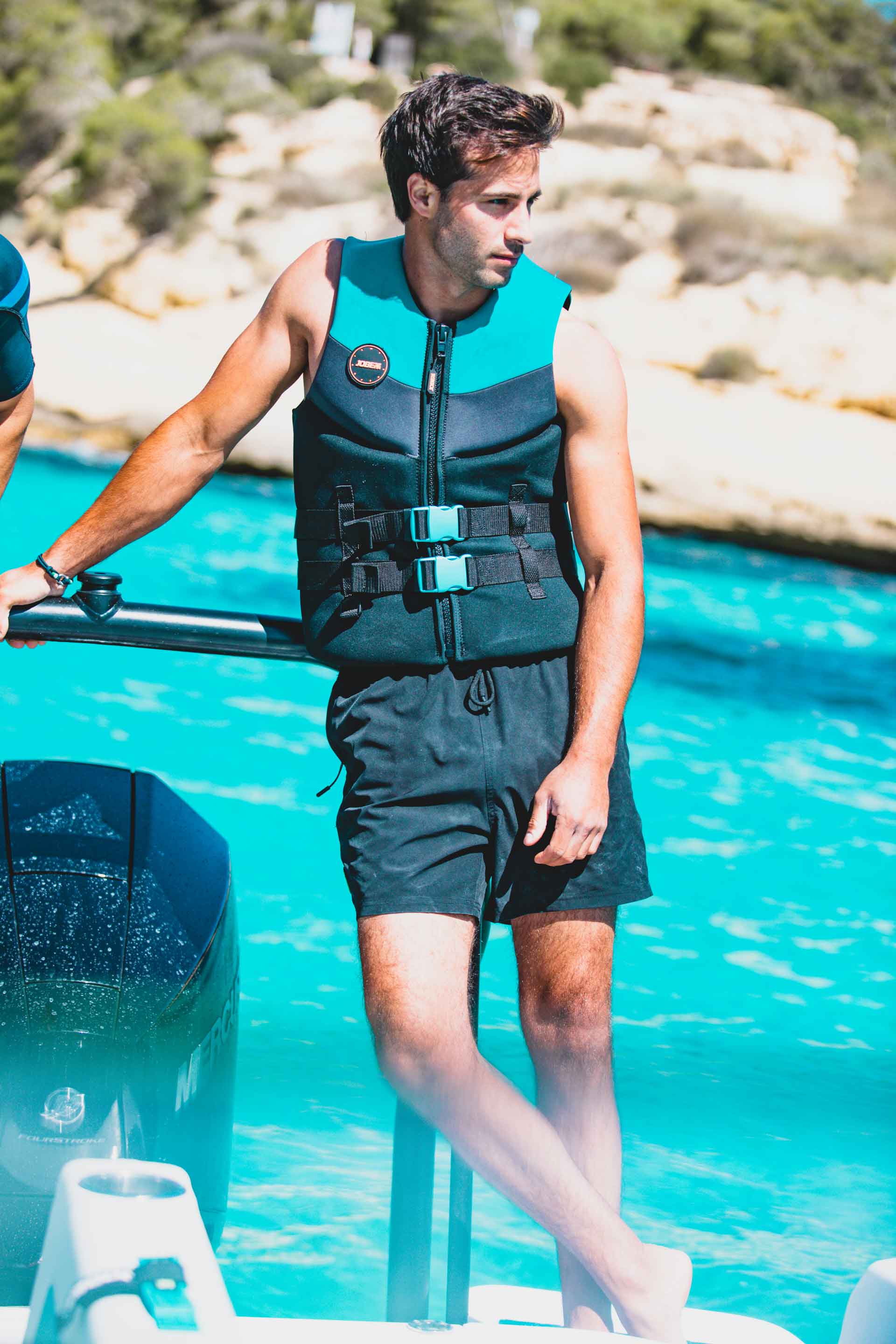 244922011db_Neopren Weste Real Teal