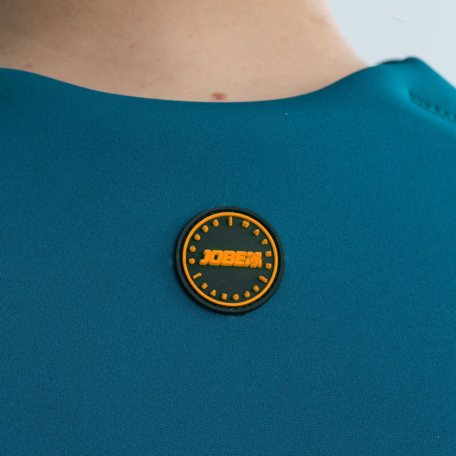 244922011db_Neopren Weste Real Teal